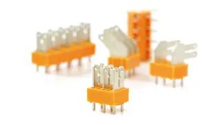 PCB terminals with flat-blade connection